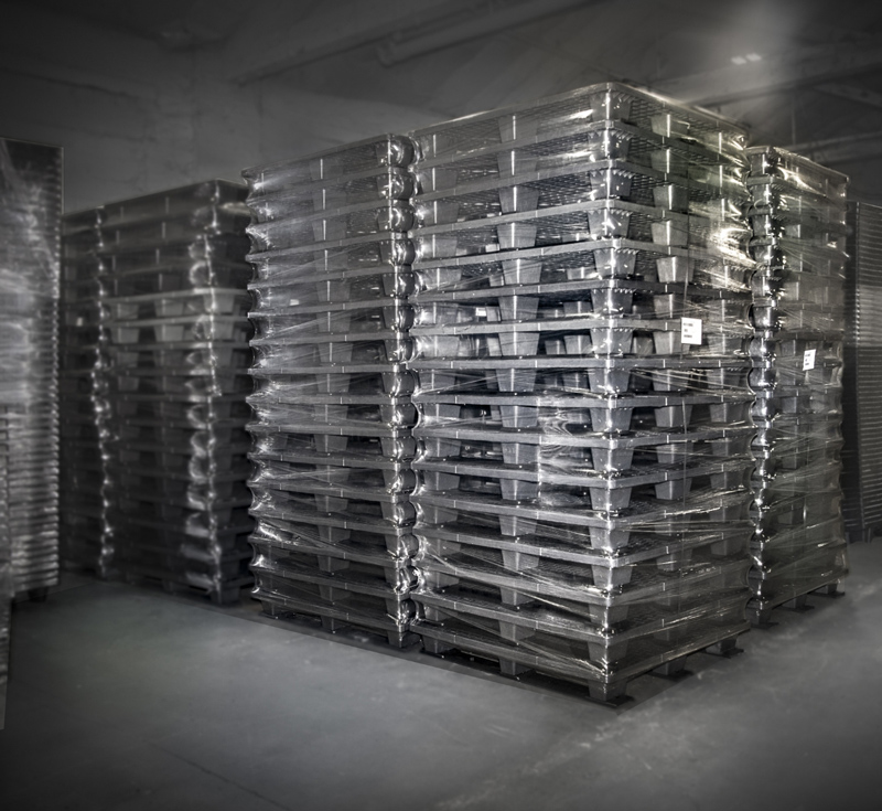 Plastic pallets stacked