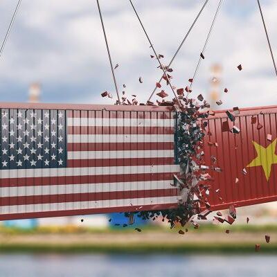 Chinese and US shipping containers smashing into one another
