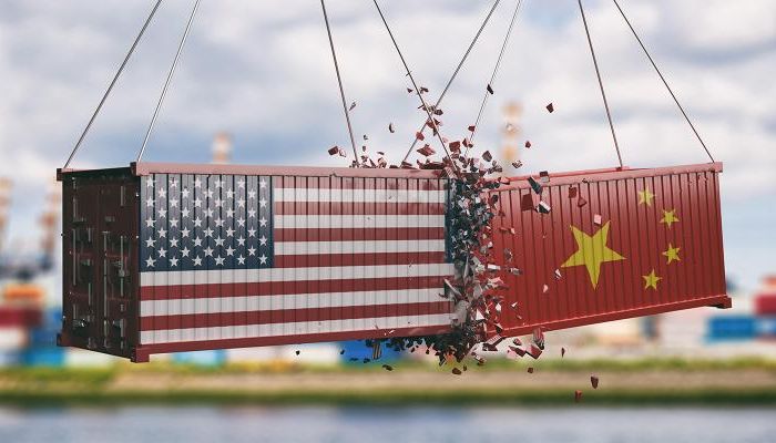 Chinese and US shipping containers smashing into one another